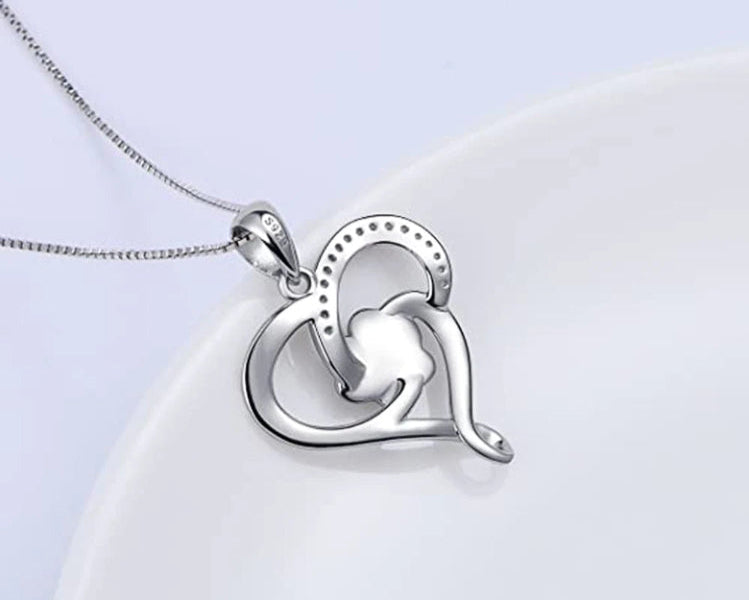 Dog Footprints Heart Necklace...